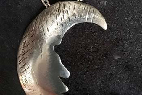 Man In Moon Polished Pendant